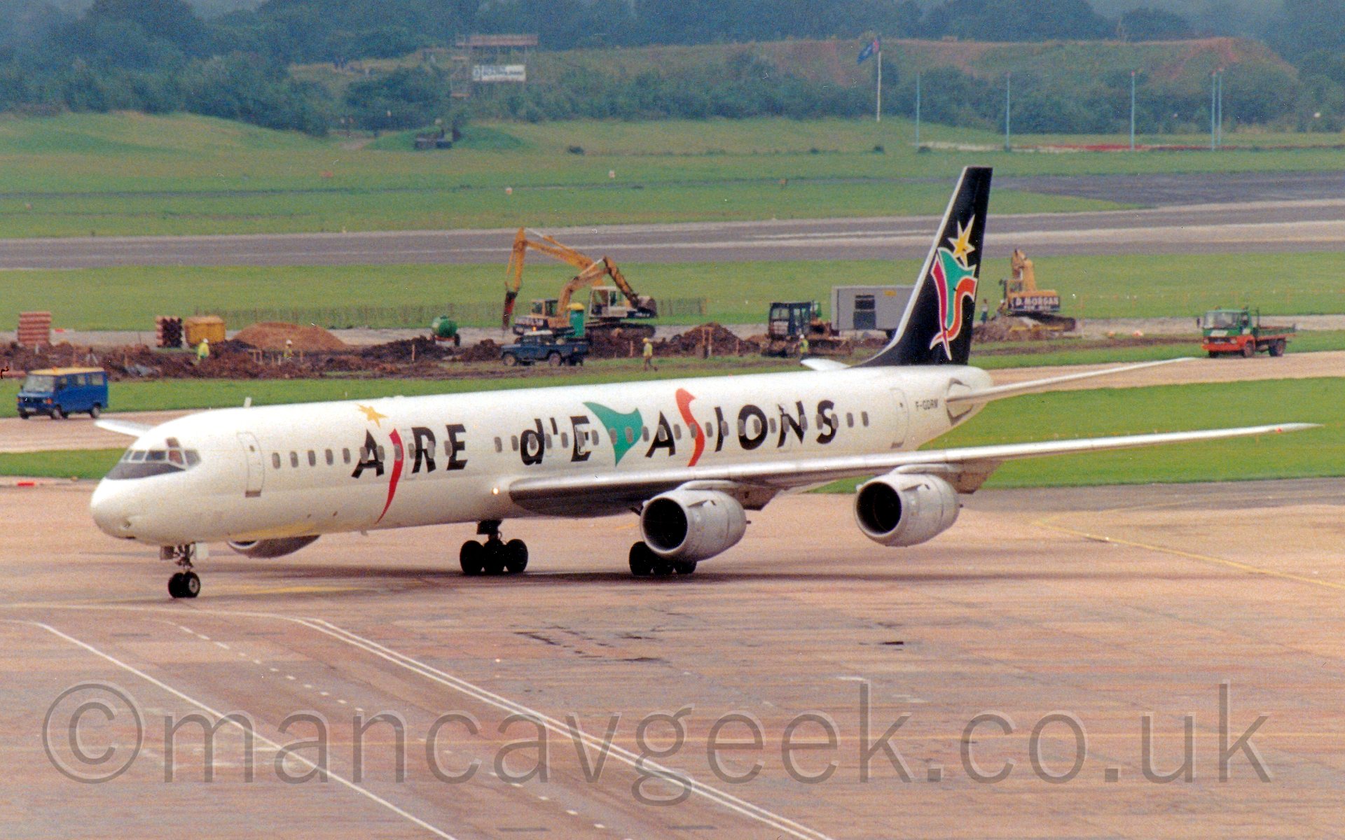 F-GDRM, Douglas DC-8-73, Air Evasion-Aire d'Evasions, at Manchester Airport, some time in 1993.